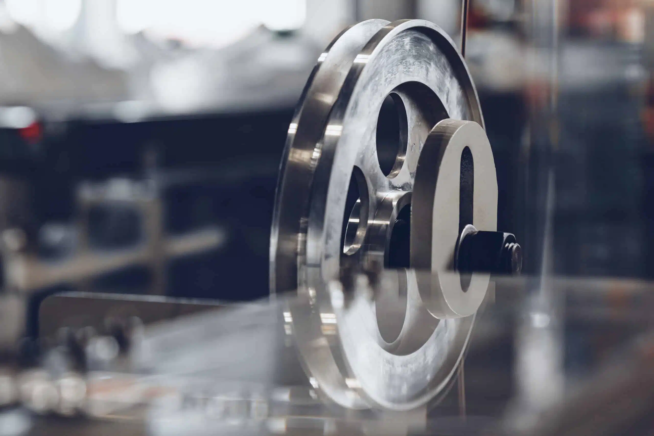 precision machined metal pulley wheel industrial component in manufacturing