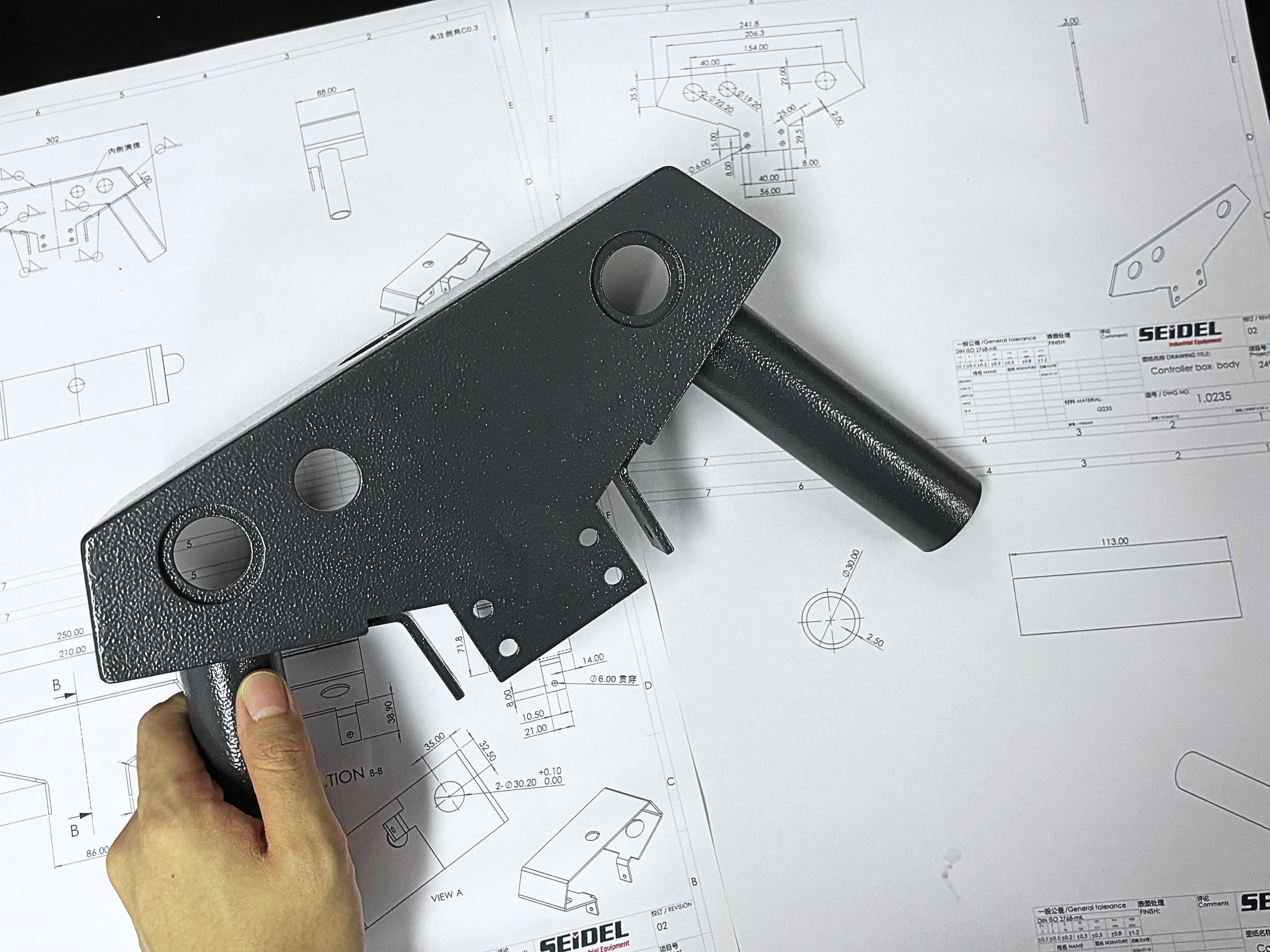 custom fabricated metal bracket mechanical component on engineering drawing